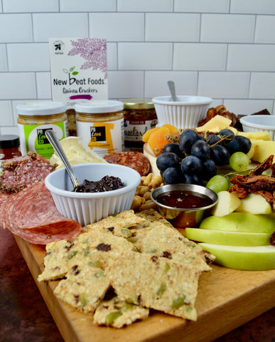 All-natural peanut butter and almond butter. Charcuterie board for mother's day. Party favorites for Mother's Day 2022. Cured meats, cheeses, dried fruit, fresh fruit.