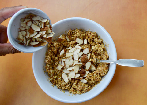 Gluten free granola made with all-natural almond butter. Smooth almond butter made by the PB Love Company. Denver, Colorado. 