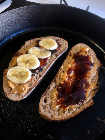 Grilled peanut butter and jelly sandwich with crunchy peanut butter.