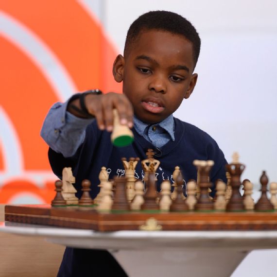 Samuel Reshevsky, age 8, defeating several chess masters at once