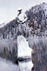 Man atop Old Man of the Lake