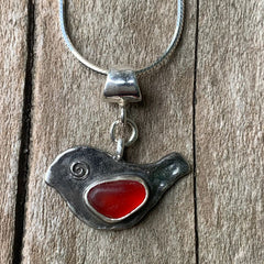 rare red sea glass bird pendant