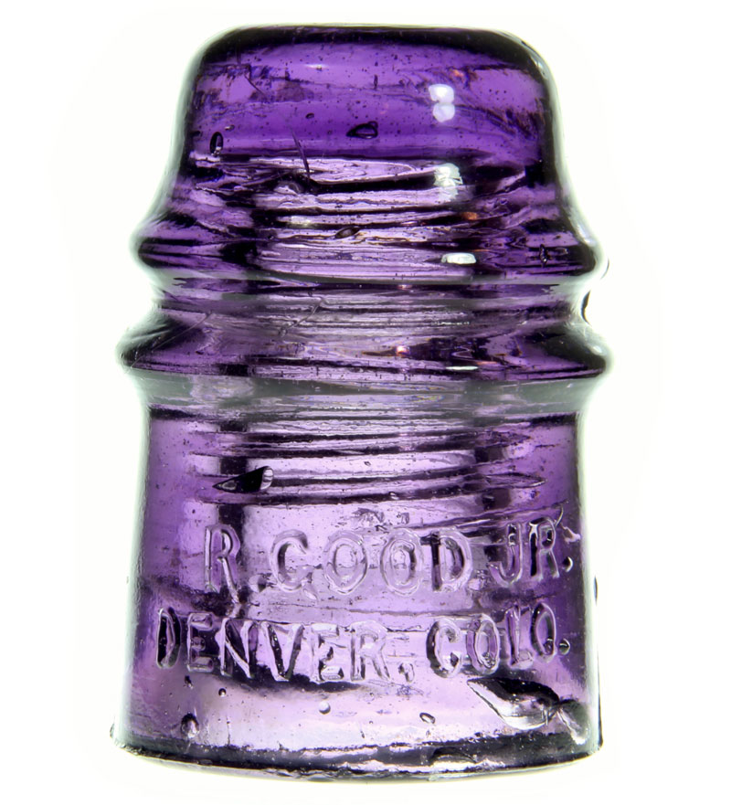 purple antique glass insulator