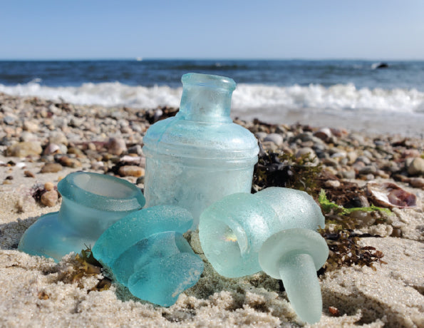 aqua blue sea glass on the beach