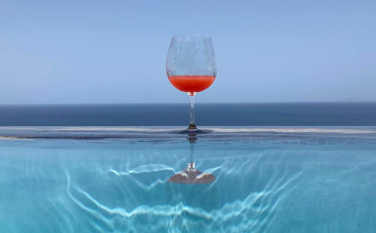 cocktail on edge of infinity pool