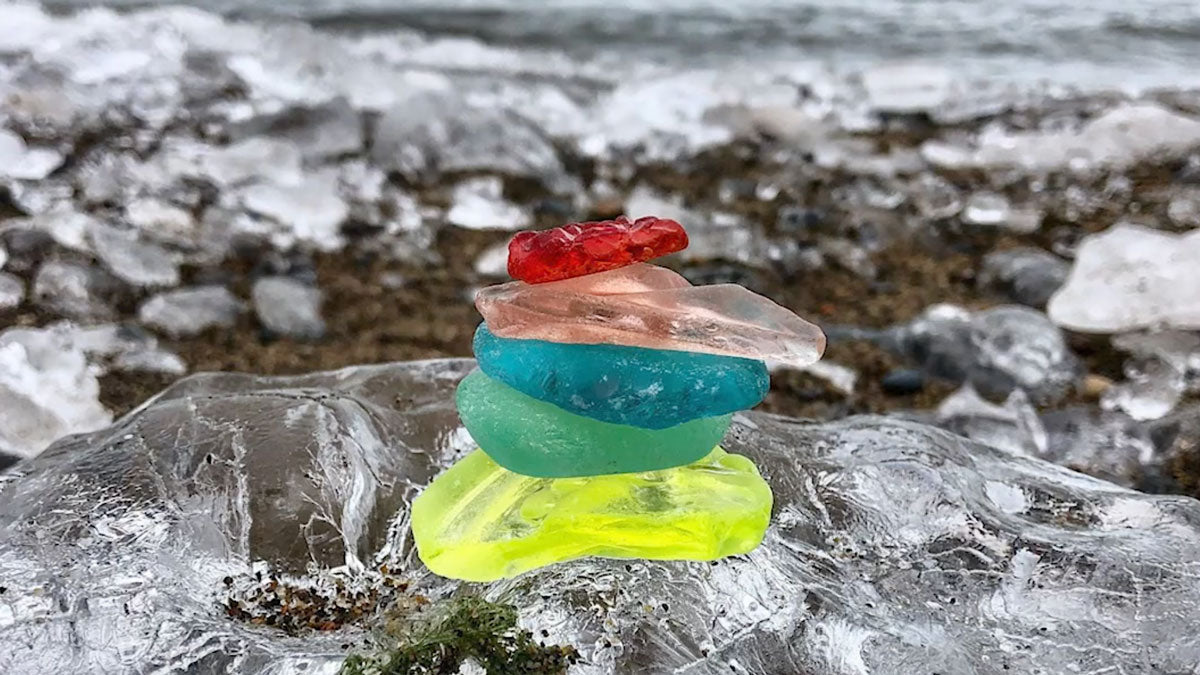 sea glass stack on icy beach
