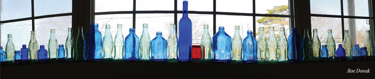 beach bottles on shelf