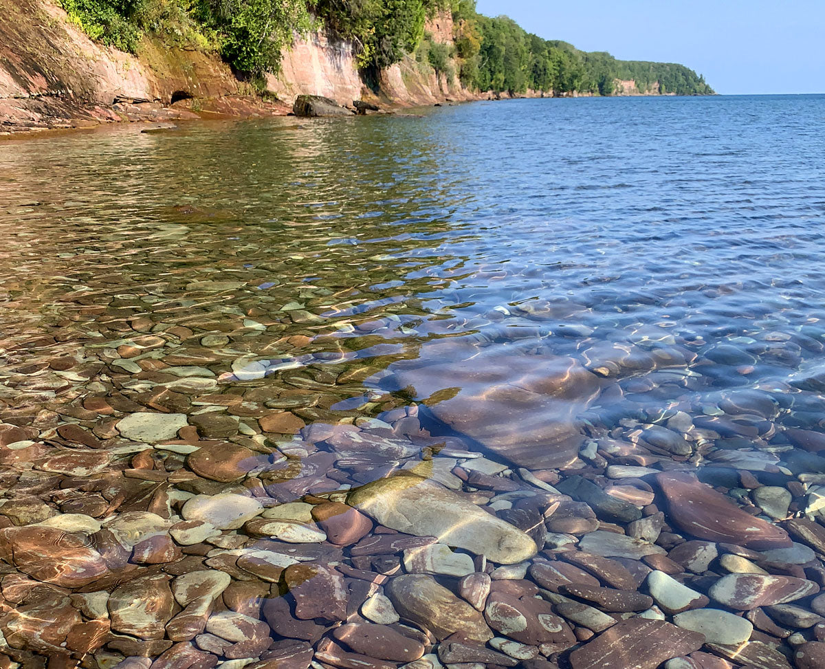 great lakes view of lake with rocks in the water