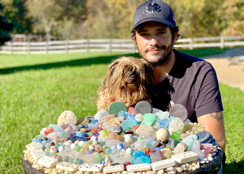 kyle davis and LC with his collection of sea glass