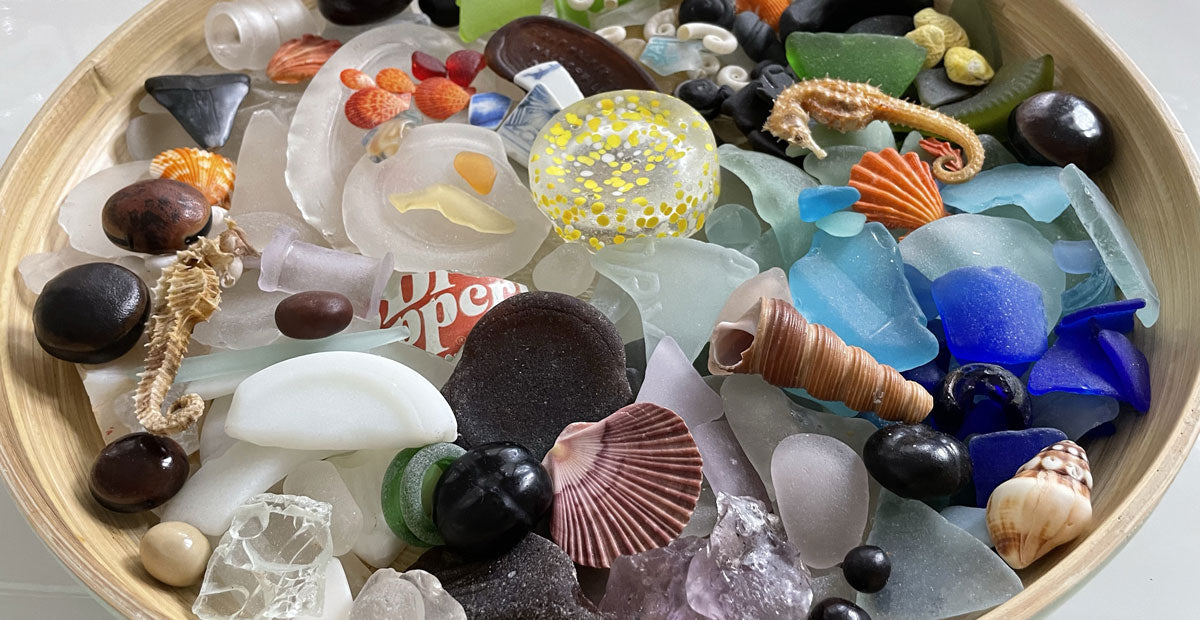 bowl of colorful sea glass and shells