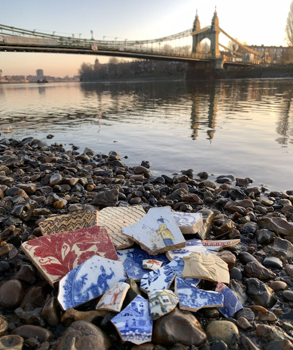 sea pottery on river thames foreshore