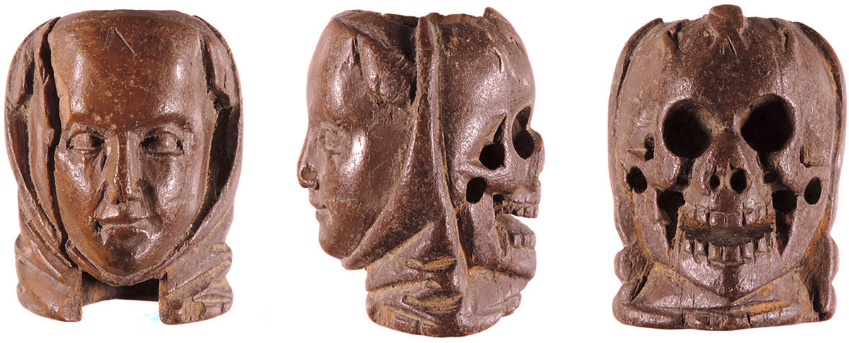 Memento mori bead depicting a woman and skull (PAS).