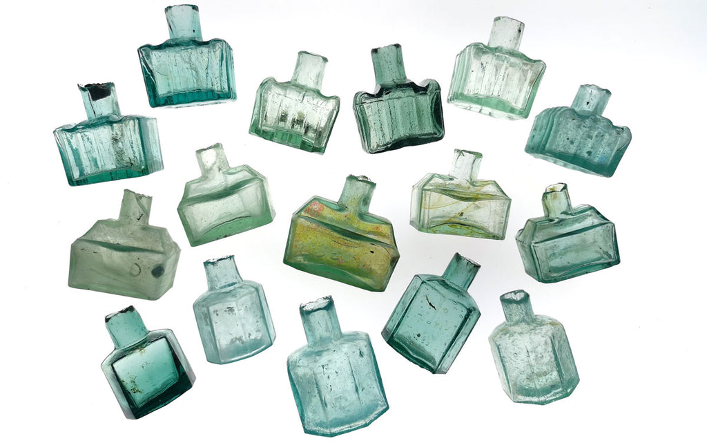 beautiful aqua sea glass ink bottles from england