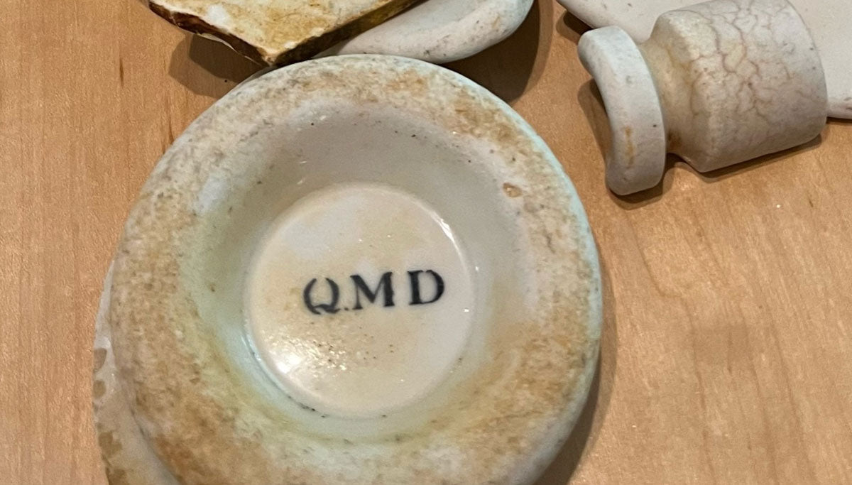 From 1775 to 1912, the Quartermaster Department was responsible for U.S. Army supplies, such as the Army mug this sea pottery piece came from, which was found on Great Diamond Island.