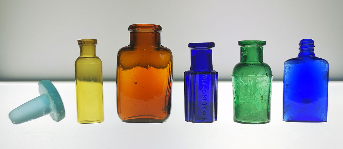 colorful antique poison and medicine bottles