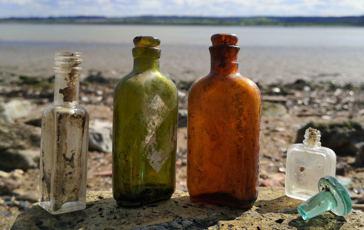 tiny antique bottles found on beach in england