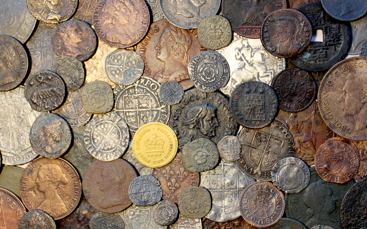 coins and metal tokens jetons from london