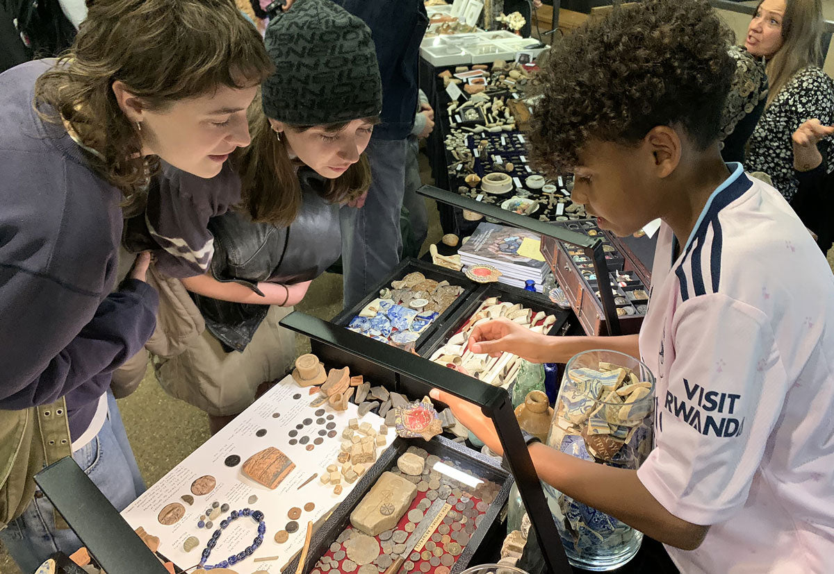 Jayden Sandy showing his collection to visitors