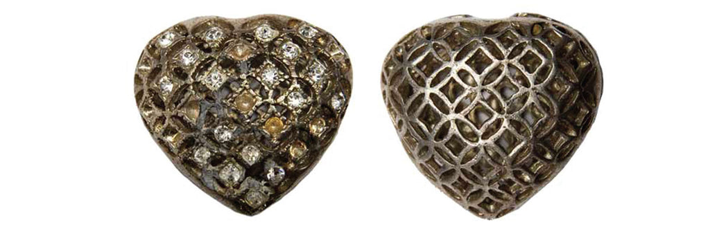 Silver, heart-shaped pendant , Nick Stevens. 