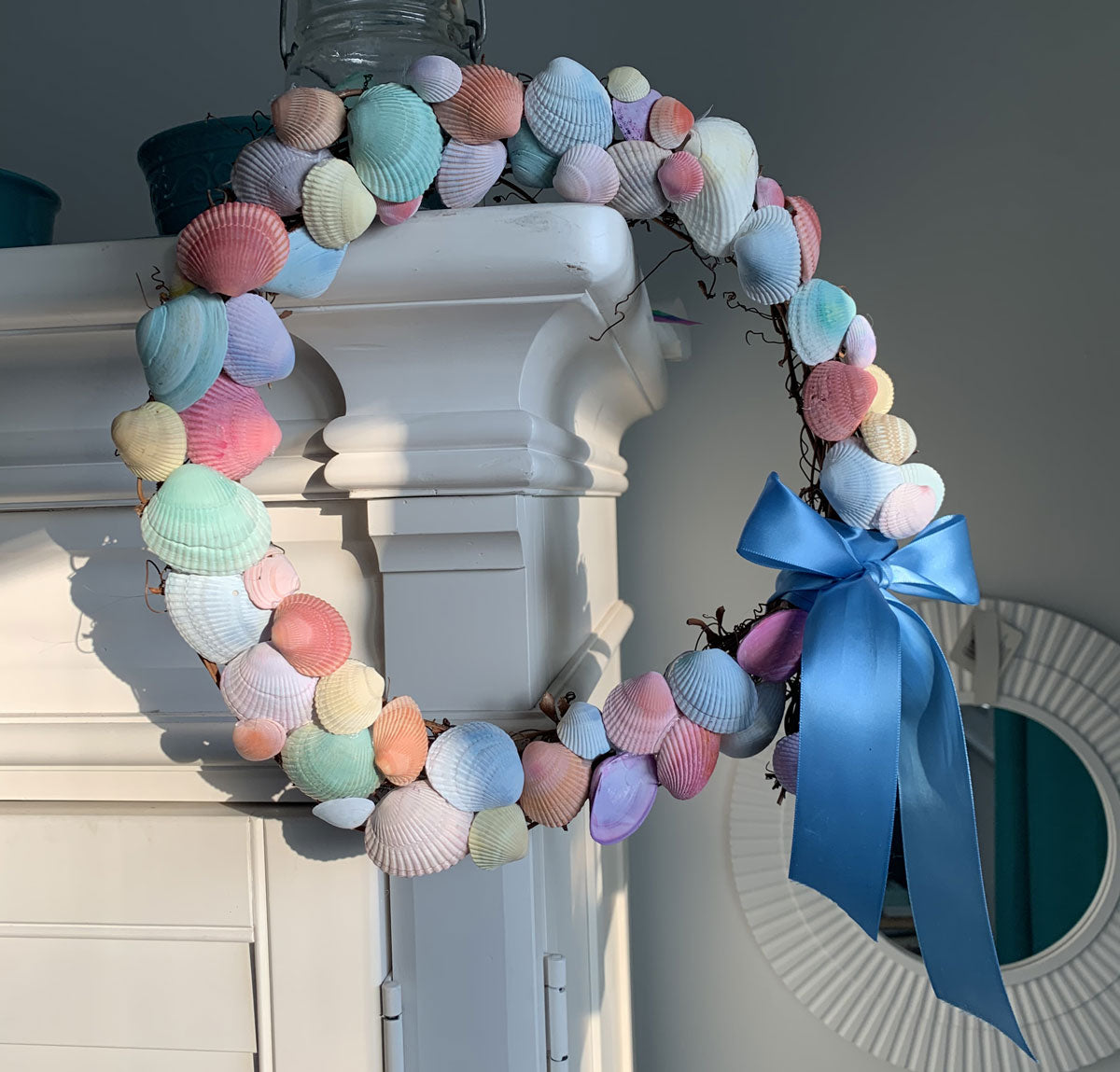 easter wreath made from colorful seashells