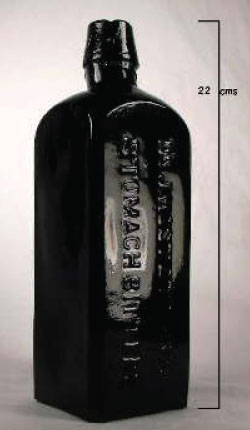 antique black glass bottle