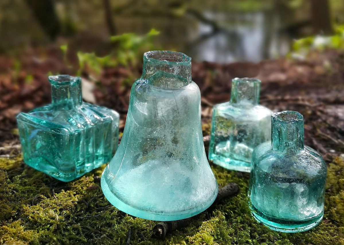 aqua and turquoise glass antique bottles from english stream