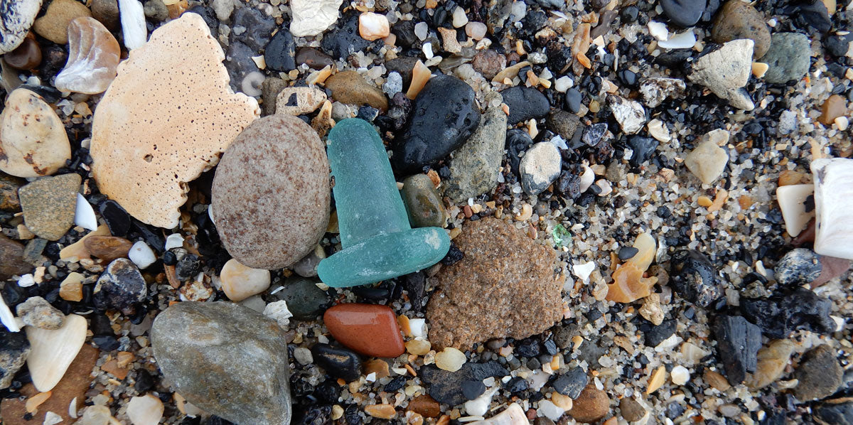 turquoise sea glass stopper found on beach in scotland