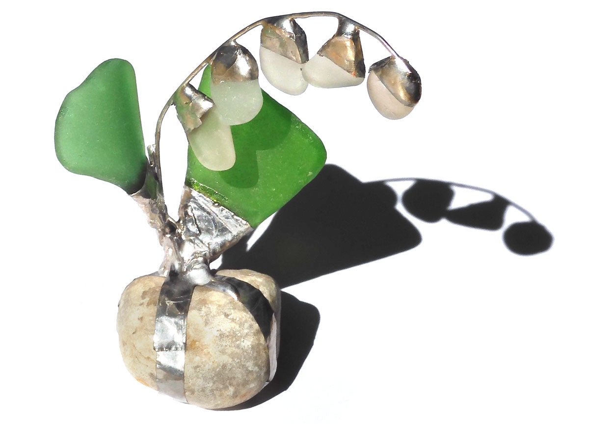 flower sculpture made with sea glass