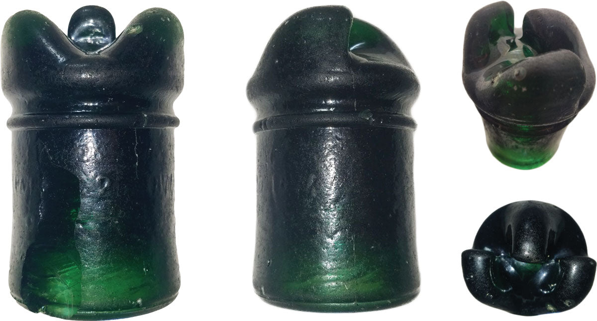 vintage glass insulator found on the beach