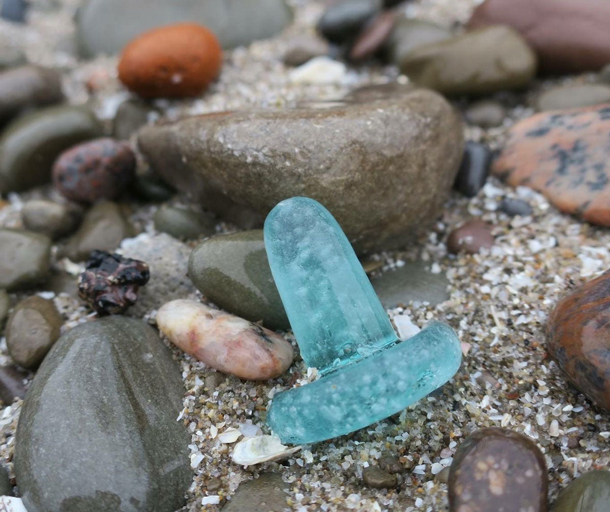 beach glass stopper on canadian beach in winter