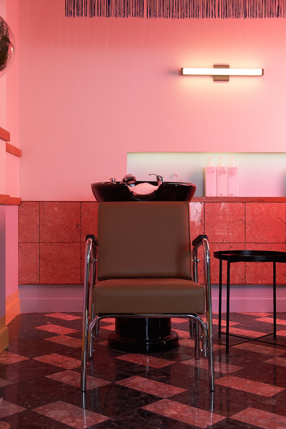 Salon wash basin with red lighting