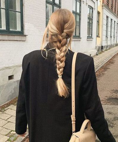 blonde girl with her hair french braided