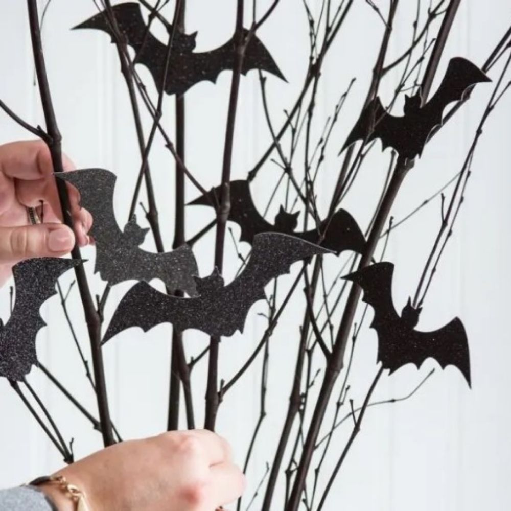 Halloween Centrepiece with Black Glitter Bat Cutouts on Twigs I Halloween Party Ideas I My Dream Party Shop Blog