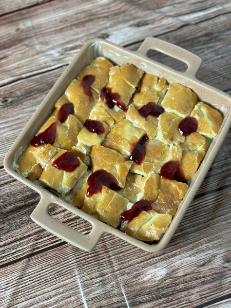 Thumb Bread bread pudding with drops of jam in baking tray