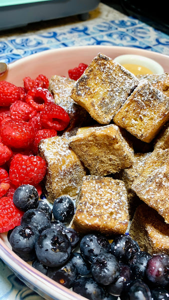 Thumb Bread maple french toast bites with berries and powdered sugar