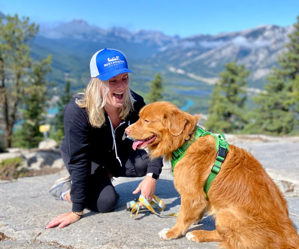Female with duck toller dog hiking tunnel mountain banff alberta