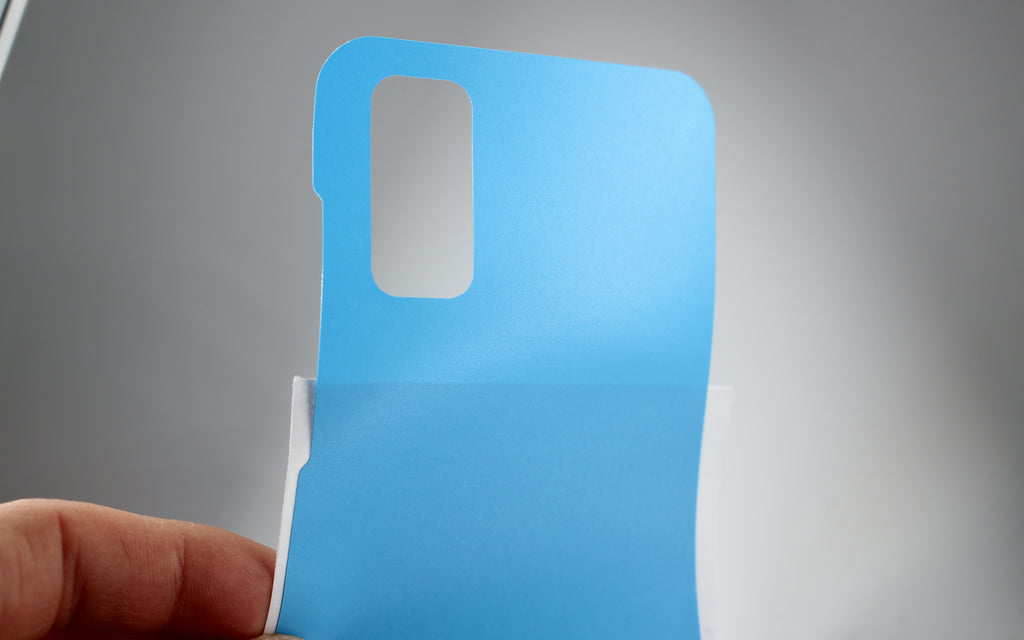 Matt Sky Blue Galaxy S20 Vinyl Wrap Re-attached to Paper