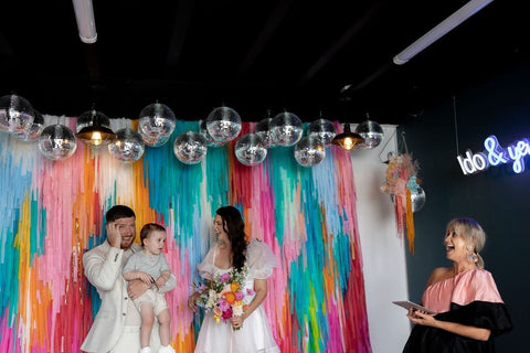 BRIGHT COLOURED WEDDING BACKGROUND WITH DISCO BALLS