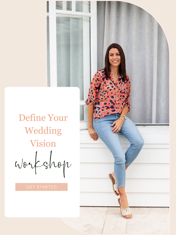 Define your wedding vision workshop. Yvette the wedding expert sitting leaning on a window smiling