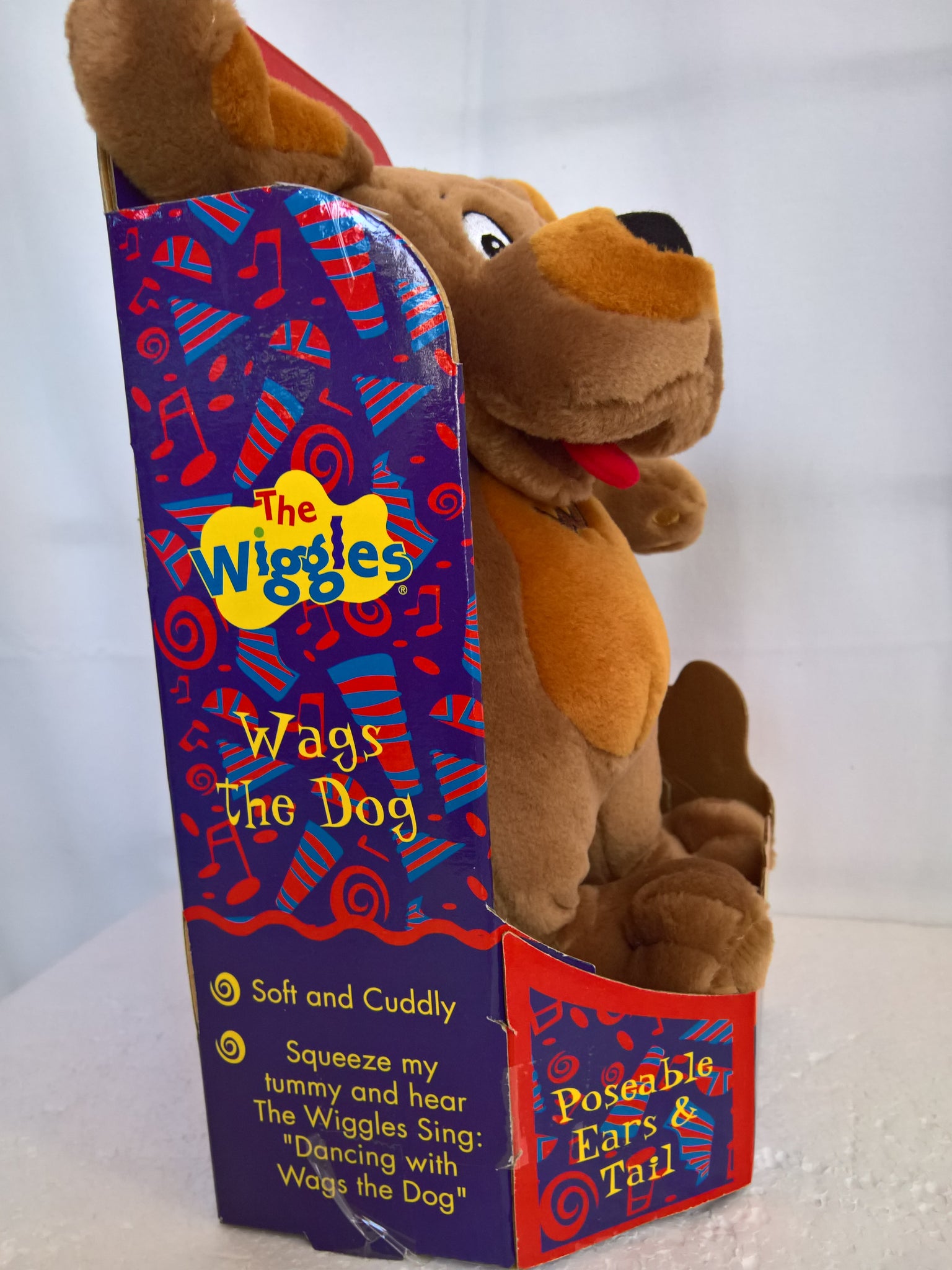 wags the dog plush toy