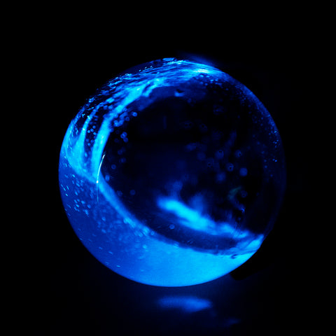 Bioluminescent Bio-Orb swirl of PyroDinos by Pryofarm.  PyroFarms logo is based on this image
