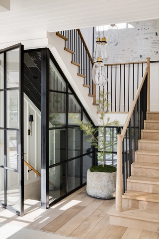 Indoor entryway with wood stairs