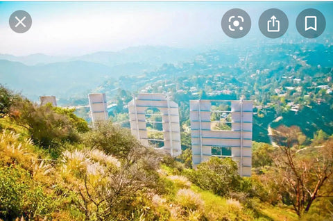 pastel hued Hollywood sign from behind