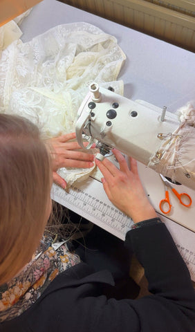 sewing handmade wedding gown
