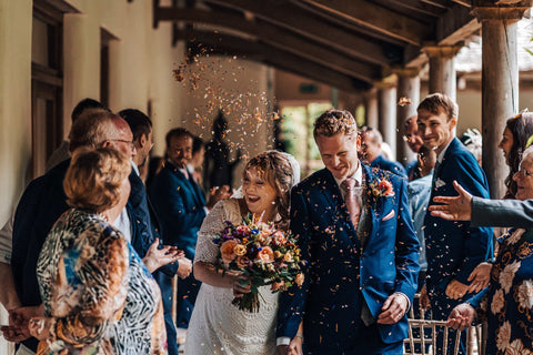 sustainable wedding flower petal confetti married couple