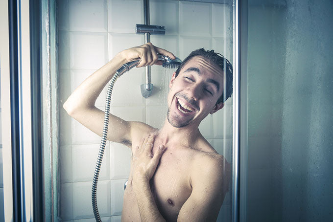 happy man showering