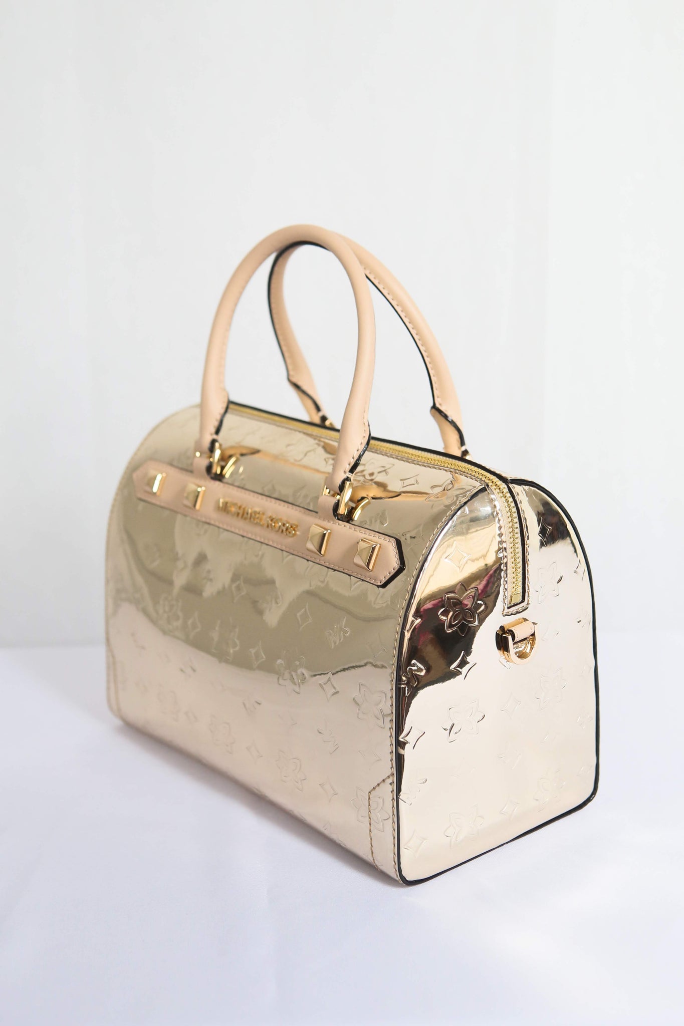 michael kors gold duffle bag