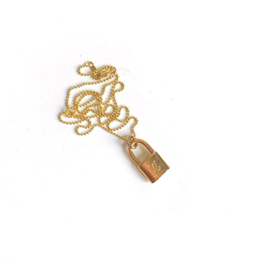 Small Vintage Gold Louis Vuitton Lock Charm Necklace – Old Soul Vintage Jewelry