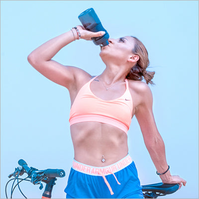 A Girl Drinking Water to Stay Hydrated