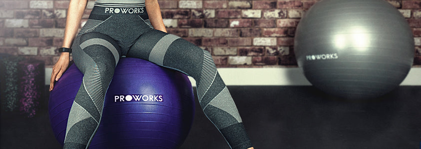 Girl Sitting on a Proworks Exercise Ball